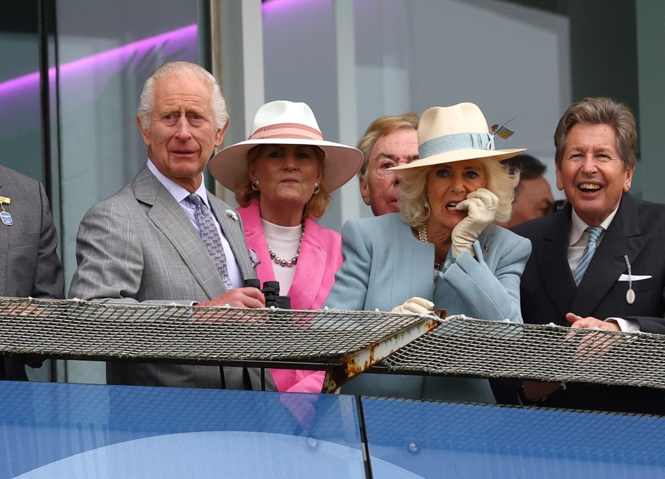 Queen Camilla looks tense as the Royal horse Treasure drops back through the pack after initially challenging in the Oaks