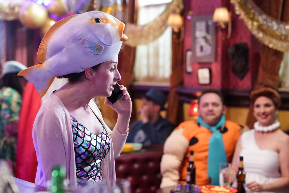 Sonia Fowler is dressed as a fish whilst she recieves a tense phonecall