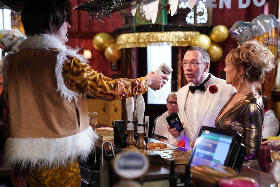 EastEnders,16-05-2024,6910,Johnny Carter (CHARLIE SUFF);Ian Beale (ADAM WOODYATT);Cindy Beale (MICHELLE COLLINS),***EMBARGOED UNTIL SAT 4th MAY 2024***
The residents of Walford get into the party spirit for Zack and Whitneys hen-do, but all is not smooth sailing when a shock event descends chaos on the celebrations,BBC PUBLIC SERVICE,Jack Barnes/Kieron McCarron