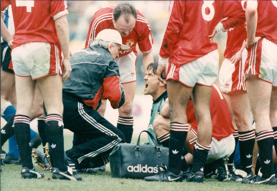 Sealey got into a furious row with the United physio after suffering a horror knee injury