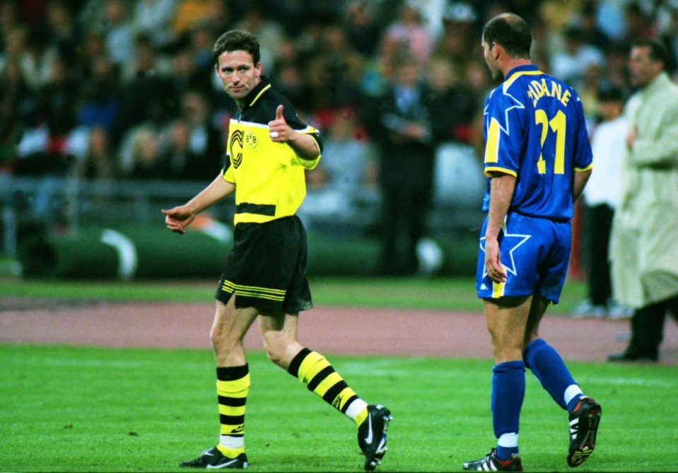 Mandatory Credit: Photo by Colorsport/REX/Shutterstock (3149660a) Football - 1997 UEFA Champions League Final - Borussia Dortmund 3 Juventus 1 Thumbs up from Dortmund's Paul Lambert with Zinedine Zidane right during the game at the Olympiastadion Munich 1997 Champs Lge Final: Borussia D 3 Juventus 1 Sport