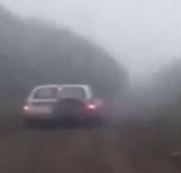 Footage showed cars speeding to the site in thick fog