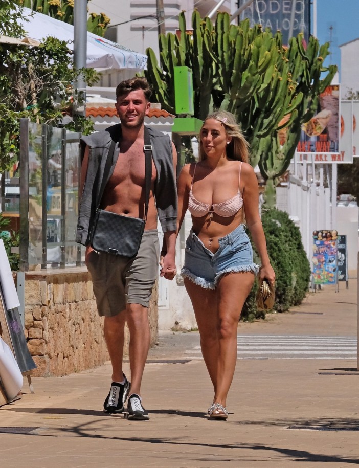 BGUK_2907893 - *EXCLUSIVE* Ibiza, SPAIN - WEB MUST CALL FOR PRICING - After calling time on her relationship with Sammy Root last year, Love Island's Jess Harding has clearly moved on, spotted out with her new mystery beau during her holiday in Ibiza. The pair soaked up the hot Spanish sunshine as they showed off some PDA by holding hands during their stroll with both showing off their tanned physiques, as Jess put on a busty display in her skimpy little bikini and a short denim skirt out on the sun kissed island. Pictured: Jess Harding BACKGRID UK 2 MAY 2024 UK: +44 208 344 2007 / uksales@backgrid.com USA: +1 310 798 9111 / usasales@backgrid.com *Pictures Containing Children Please Pixelate Face Prior To Publication*