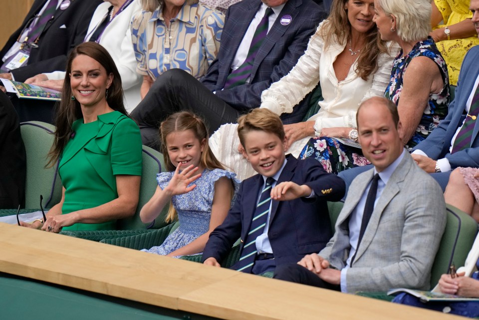 Kate, Princess of Wales, Princess Charlotte, Prince George and Britain's Prince William sit in the Royal Box on Centre Court for the final of the men's singles between Spain's Carlos Alcaraz and Serbia's Novak Djokovic on day fourteen of the Wimbledon tennis championships in London, Sunday, July 16, 2023. (AP Photo/Alastair Grant)