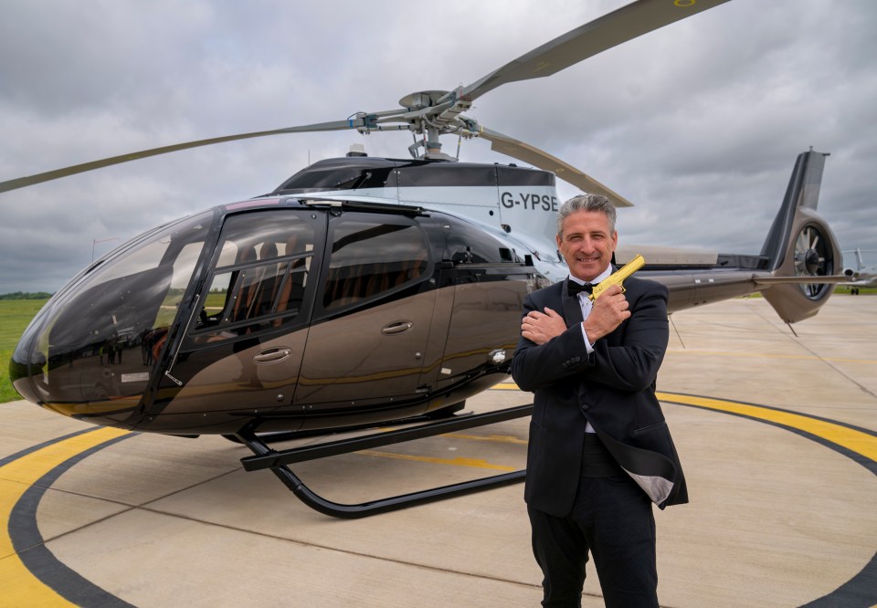 Alfie Best posed up with his Aston Martin Helicopter number 007