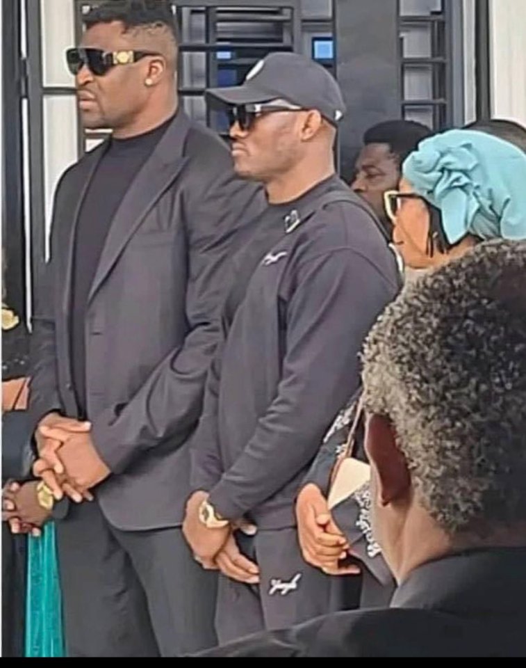 Francis Ngannou was flanked by Kamaru Usman at his son's funeral