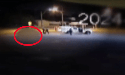 The blurred circle covers where the teen's body fell after he was shot dead