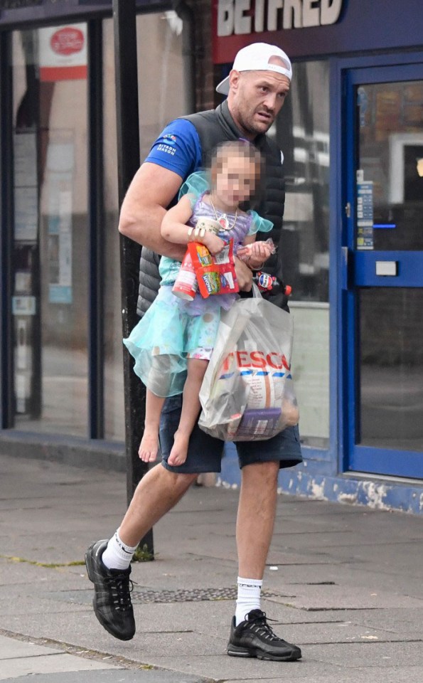 Tyson Fury looked back to full health as he went shopping