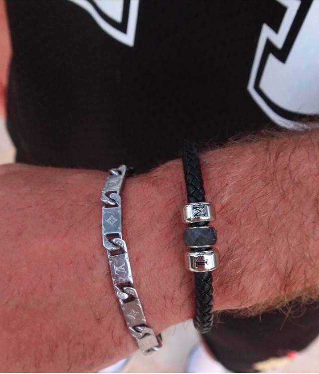 The footballer showed off his accessory with a sweet reference to their romance