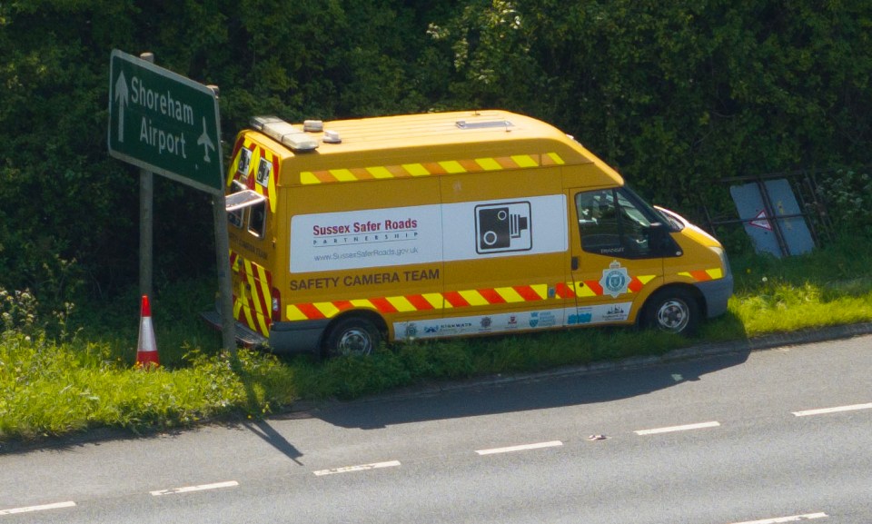 The van has been sneakily positioned directly behind a sign to catch people out