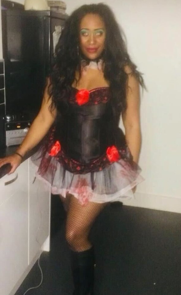 Taryn teamed the fancy dress look with fishnet tights and splattered blood