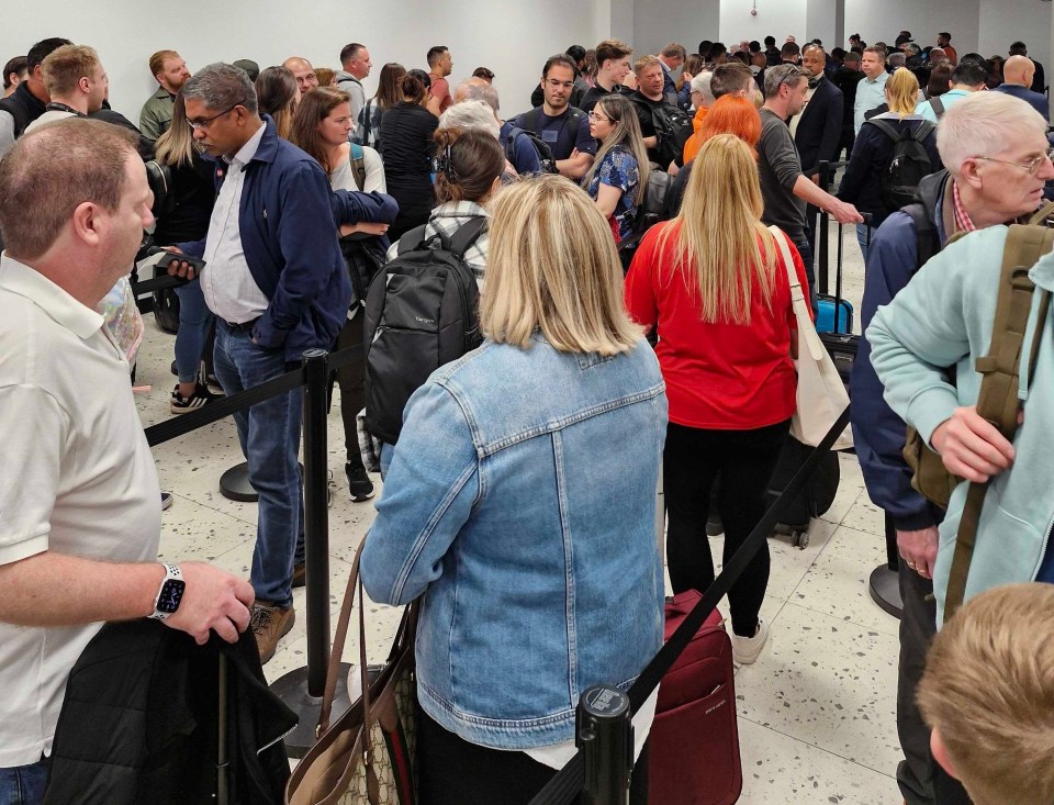 Queueing passengers at Birmingham Airport