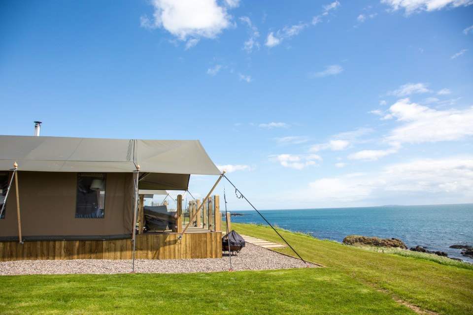 Let the waves lull you to sleep under canvas at Catchpenny Safari Lodges