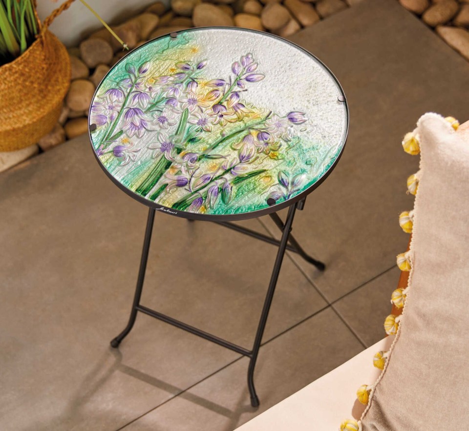 Priced at £14.99, this decorative table will instantly will add colour to your garden