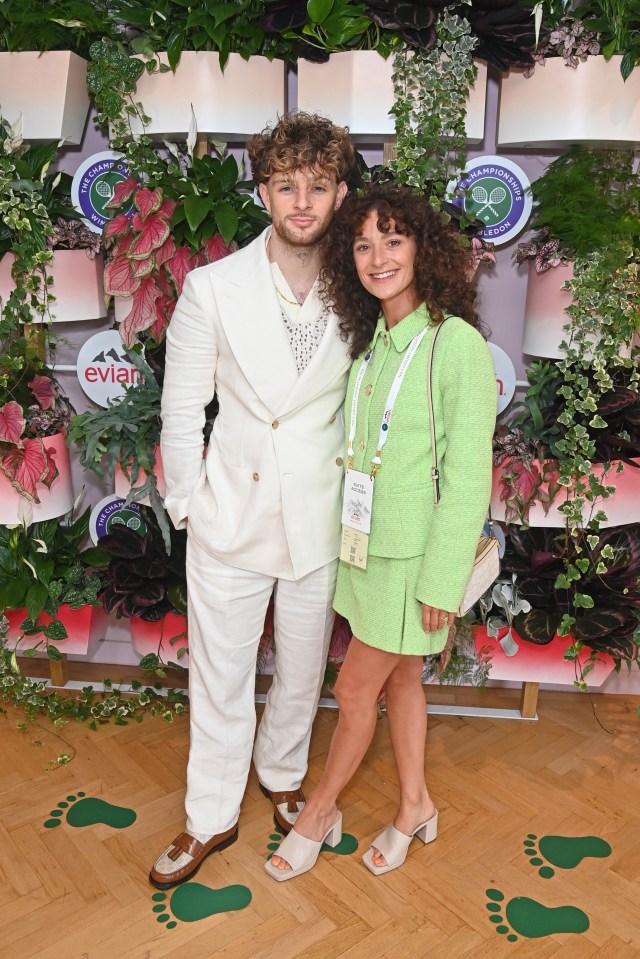 LONDON, ENGLAND - JUNE 28: Tom Grennan and Danniella Carraturo attend the evian VIP Suite, certified as carbon neutral by The Carbon Trust, at Wimbledon on June 28, 2022 in London, England. (Photo by David M. Benett/Dave Benett/Getty Images for evian)