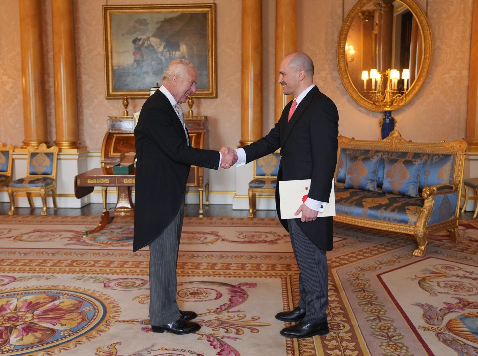 Dr. Uran Ferizi, Ambassador from the Republic of Albania, presents his credentials to Charles during a private audience at Buckingham Palace