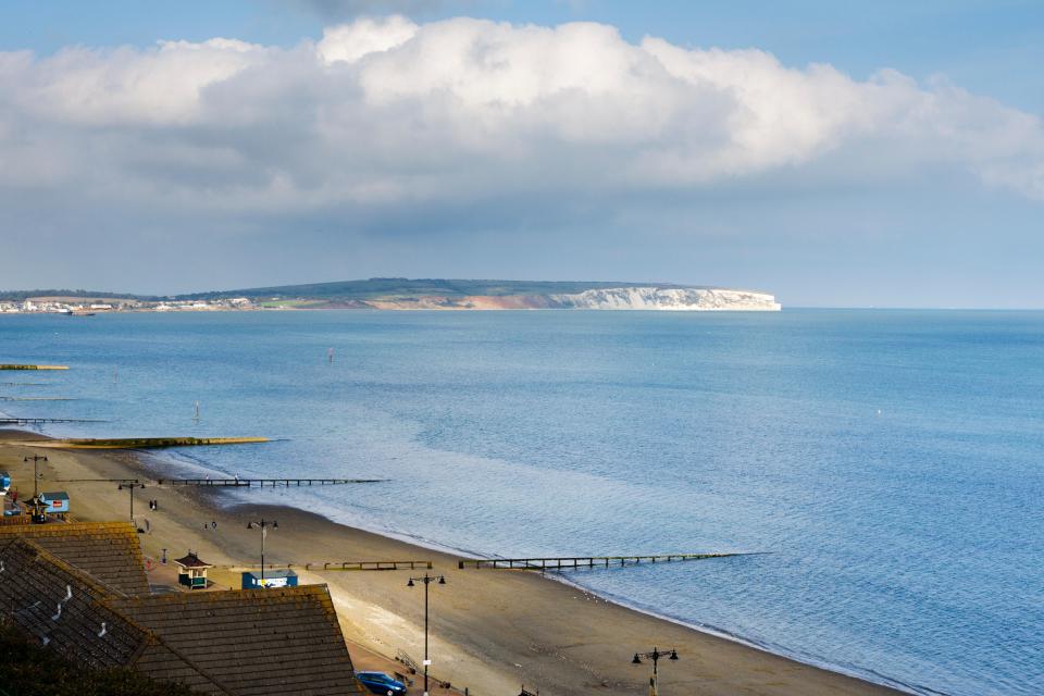 The beach is more than a mile long and has safe water for swimming