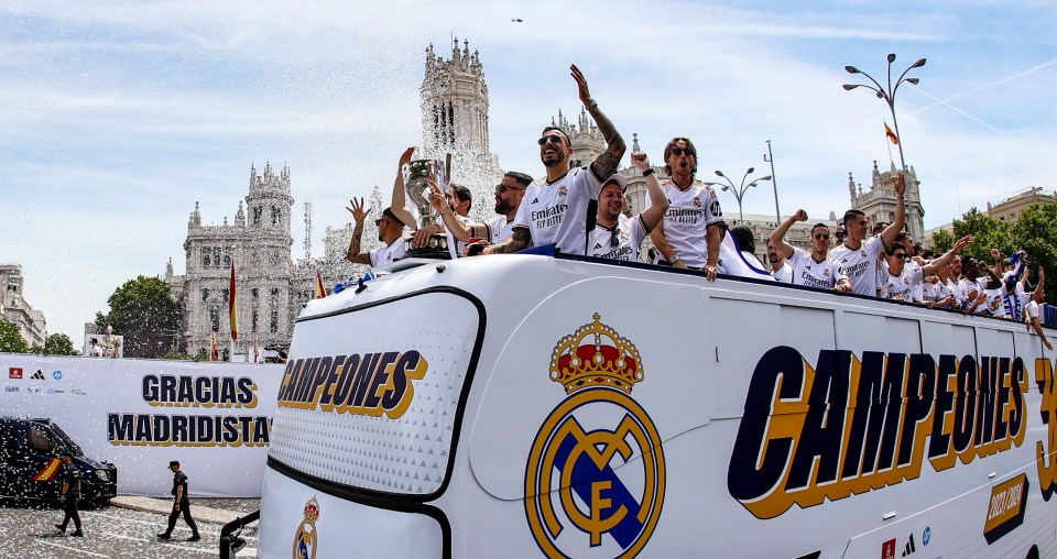 The Real Madrid players soaked in the atmosphere on an open top bus