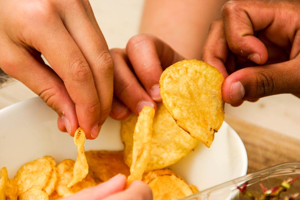 Crisps generally count as ultra-processed foods, which researchers say are harmful (stock image)