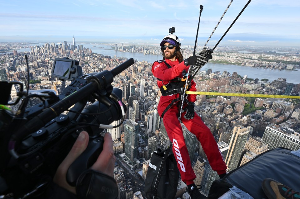 Jared Leto hangs from the Empire State Building in a charity stunt