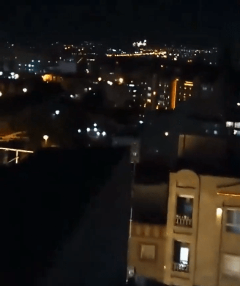 Video filmed after the crash shows a succession of bright bursts sparkling above buildings in Iran