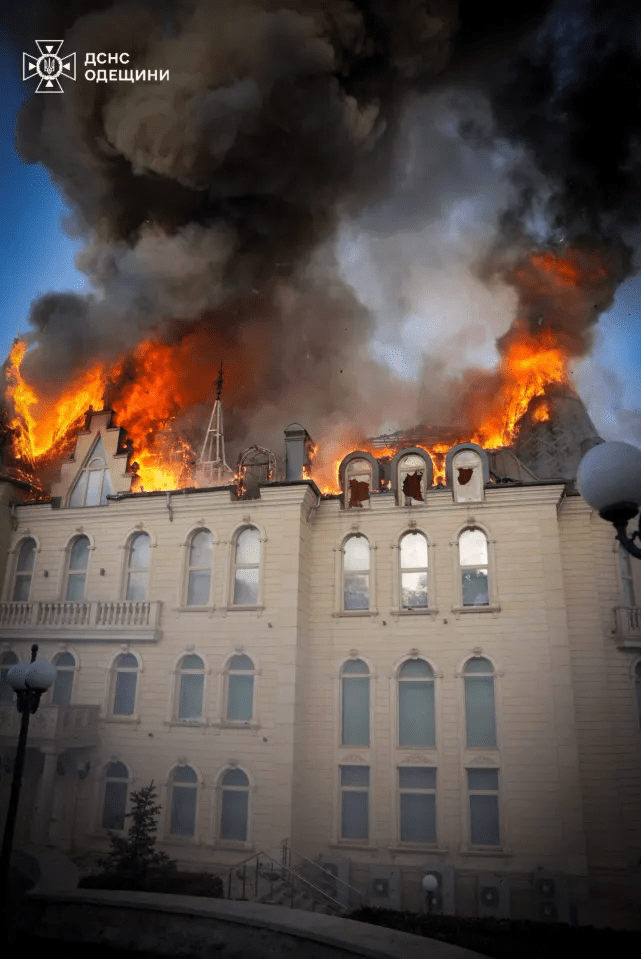 Flames rage from the roof of the private law building