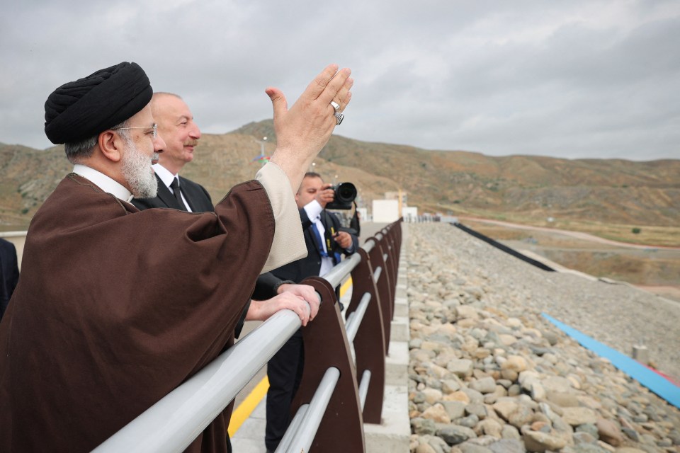 Raisi pictured inspecting the Qiz Qalasi Dam hours before the crash