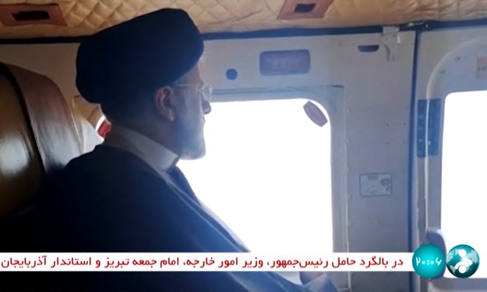 Iranian President Ebrahim Raisi is seen on board a helicopter prior to the crash