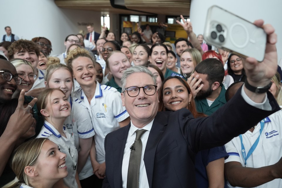 Sir Keir Starmer takes a selfie at Worcester university