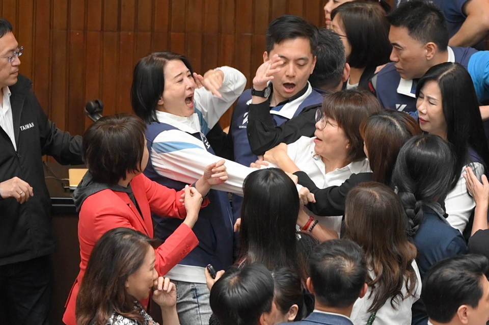 Taiwan’s main opposition Kuomintang (KMT) legislator Wang Hong-Wei was seen tackling other politicians during the ugly row