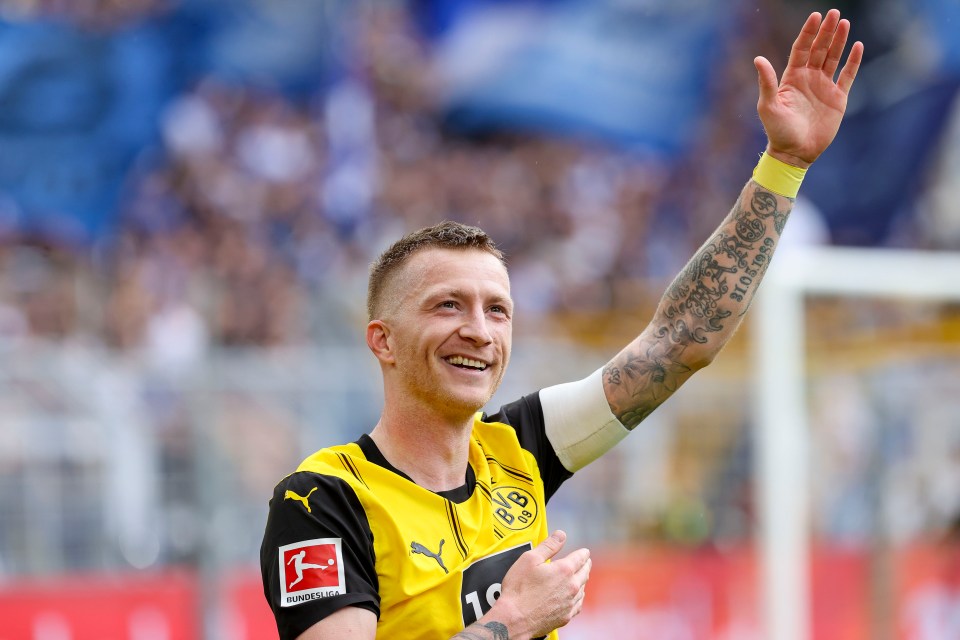 Reus has a load of tattoos including his name and date of birth on his left arm