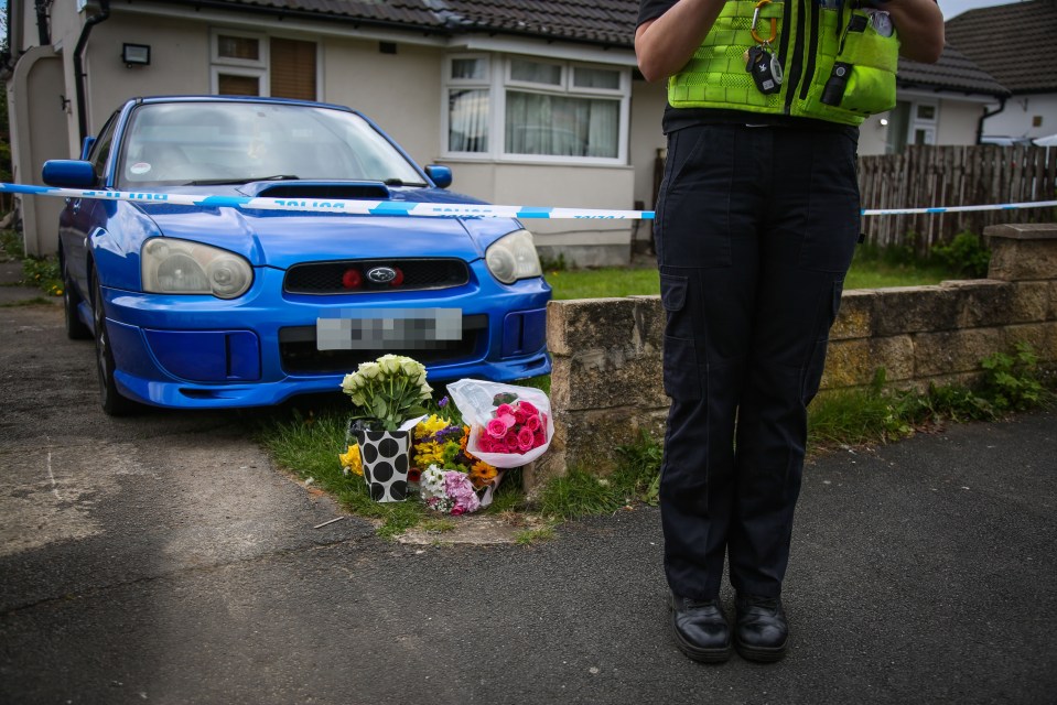 Messages and flowers have been left outside the house to the family and Eliza