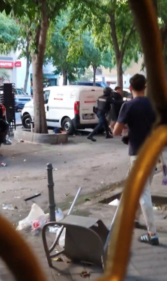 This was the moment a riot cop hit a fan with baton on a Madrid street