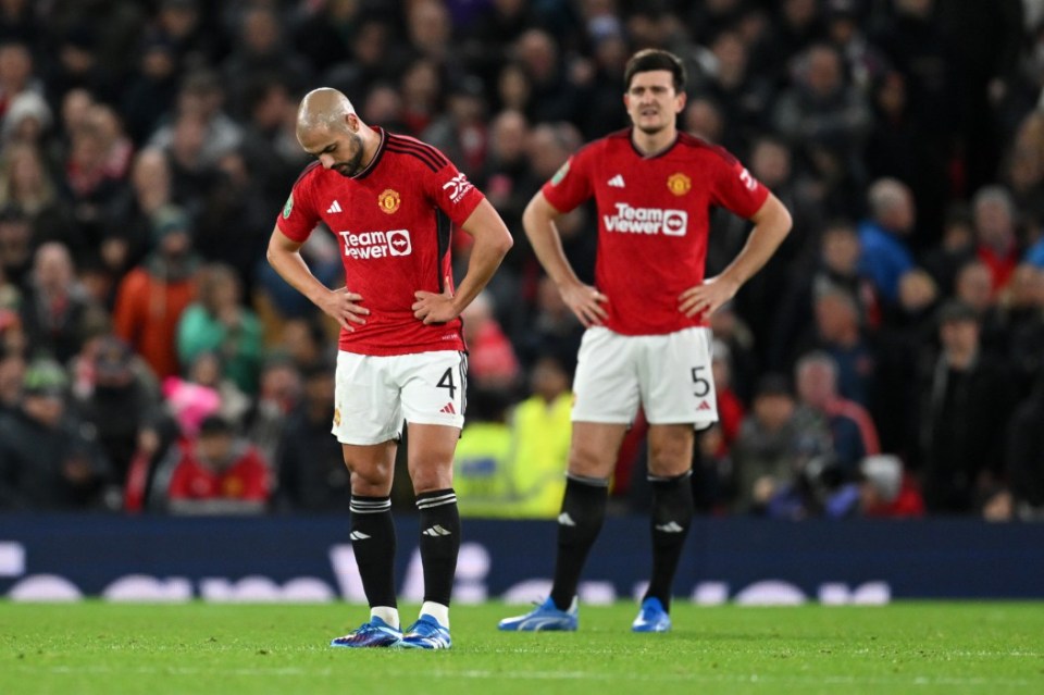 MANCHESTER, ENGLAND - NOVEMBER 01: Sofyan Amrabat of Manchester United looks dejected after Joe Willock of Newcastle United scores their sides third goal during the Carabao Cup Fourth Round match between Manchester United and Newcastle United at Old Trafford on November 01, 2023 in Manchester, England. (Photo by Michael Regan/Getty Images)