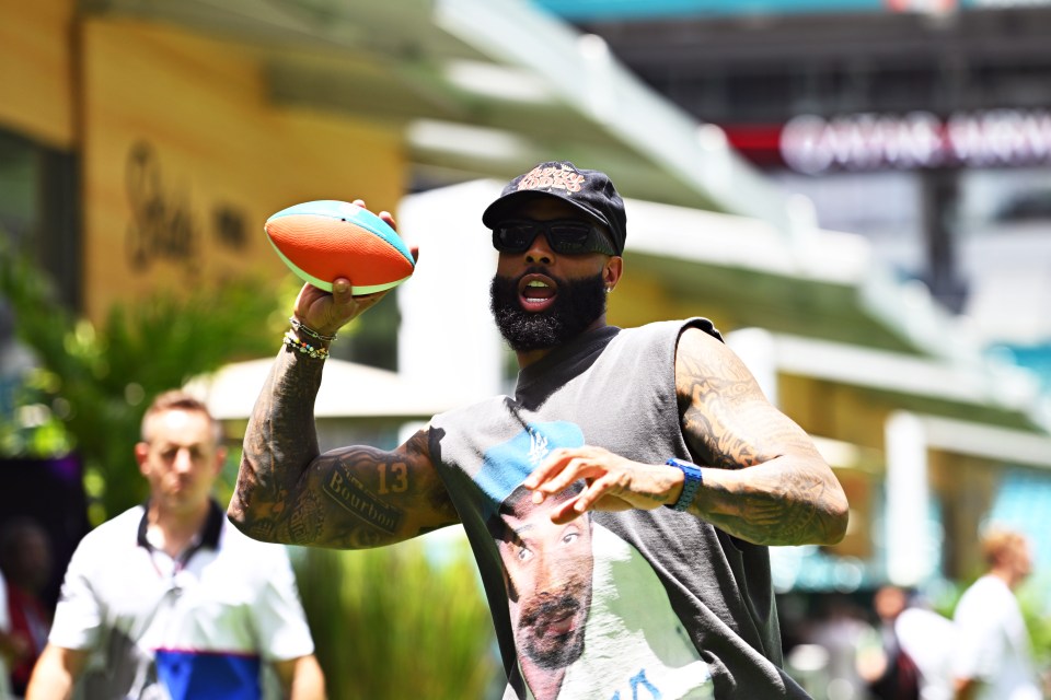 NFL star: Odell Beckham Jr was seen playing football in the paddock