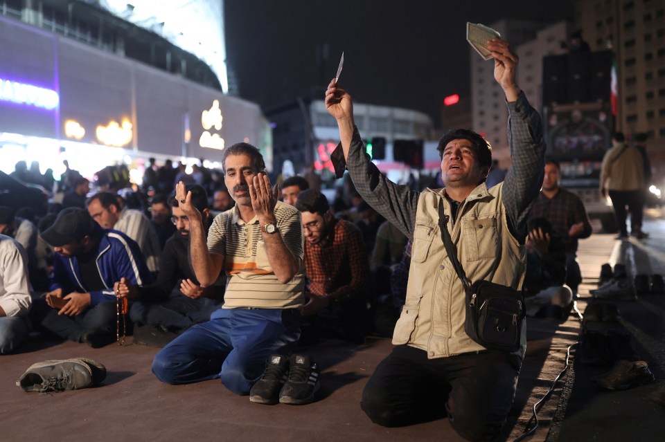 People pray for the well-being of Raisi in Tehran, Iran