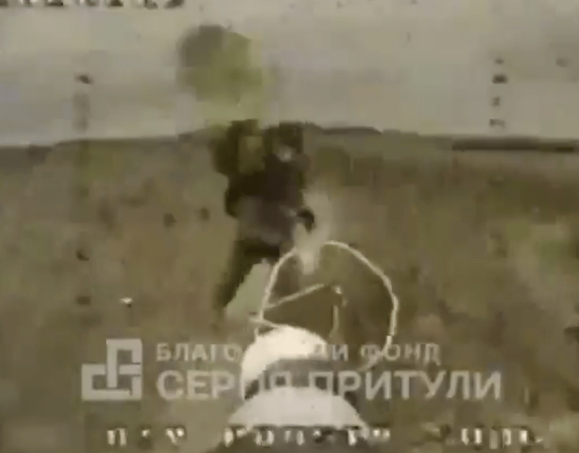 During the first drone attack the Russian soldier manged to throw one of his two jerry cans at the drone to get it to fly away momentarily