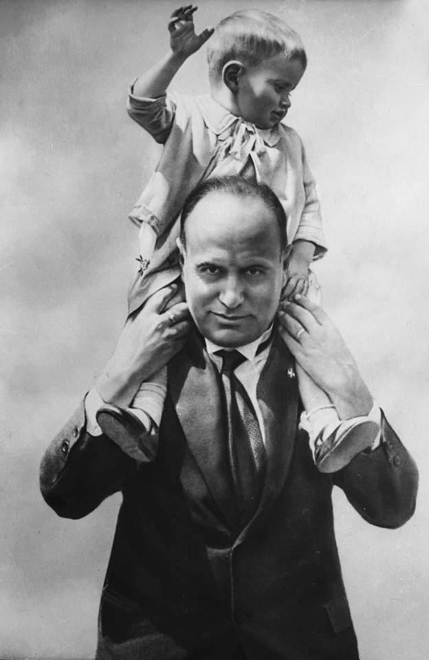 Benito Mussolini, Italian statesman, is pictured in 1923 with his son