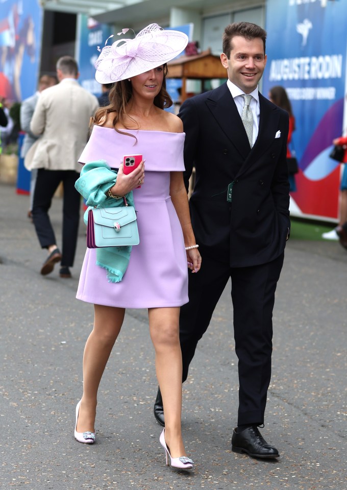 One woman was a vision in lilac as she was joined by a smartly dressed friend