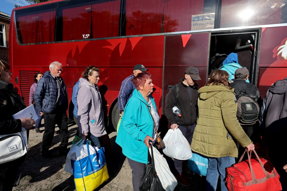 Residents of the Vovchansk district, the majority of them elderly, board buses to Kharkhiv city following the attacks