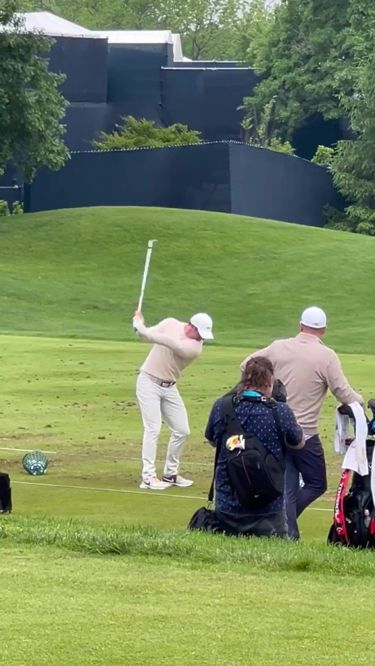 McIlroy was trying to stay focused on his warm-up for the major