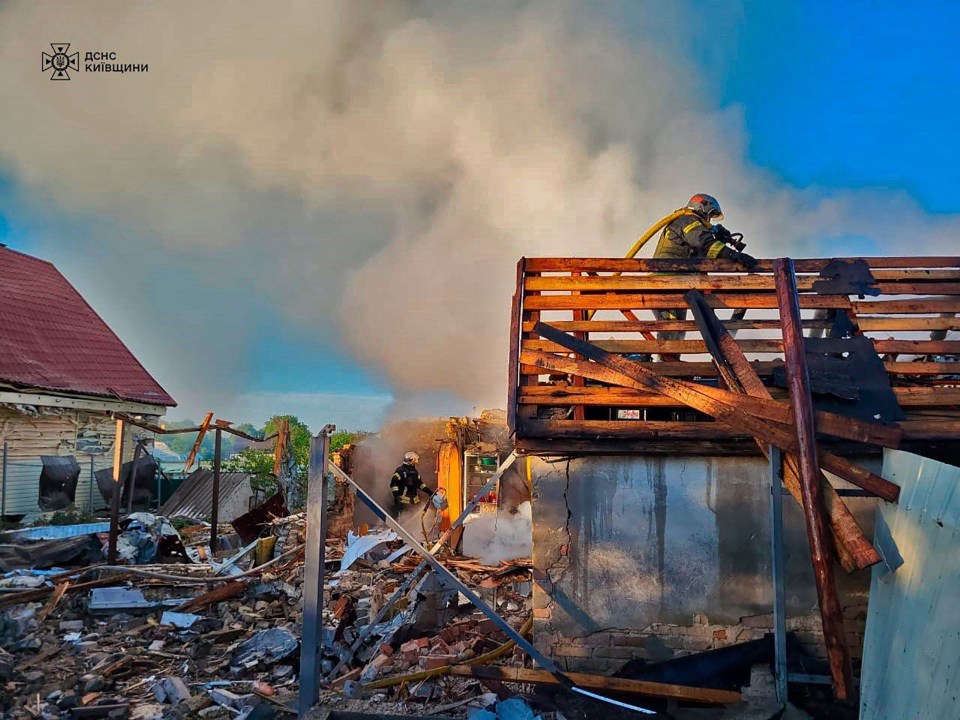 Firefighters battled to put out roaring fires caused by the Russian blasts