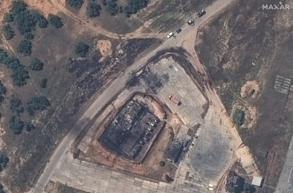 Satellite images show the obliterated base with charred debris scattered around