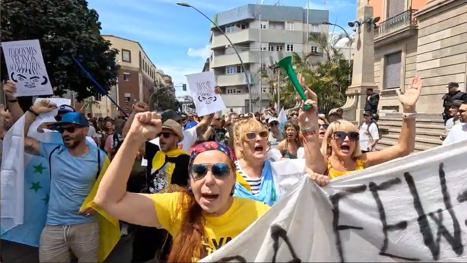 Angry locals took to the streets of Tenerife to demand a cap on tourist numbers