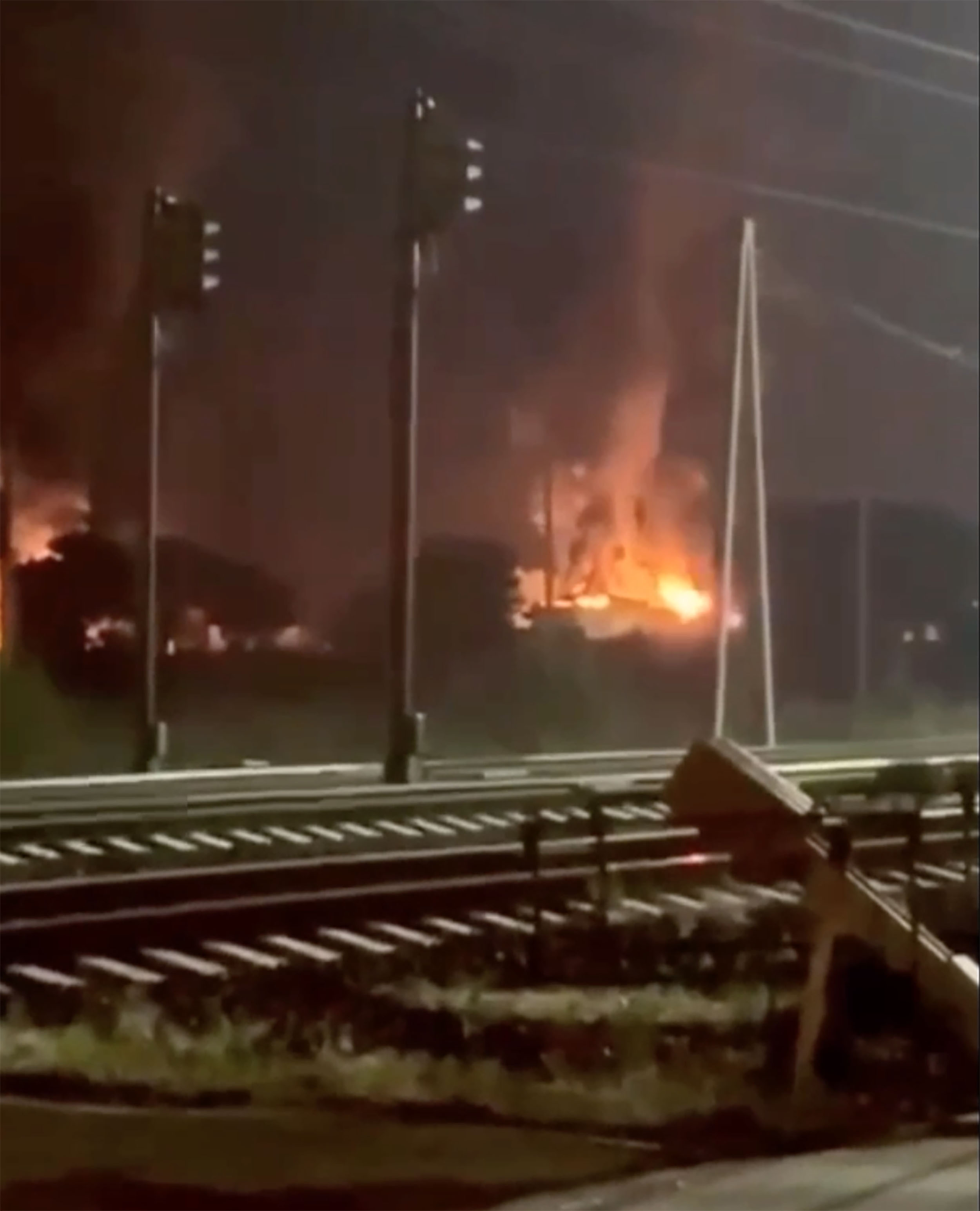 Flames roar from the Russian oil depot in Yurovka