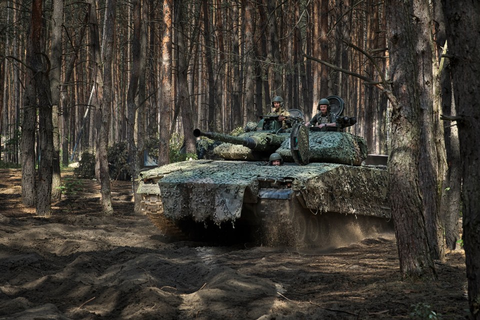 Ukrainian servicemen in a forest in the Kharkiv area amid brutal battles with Russian troops