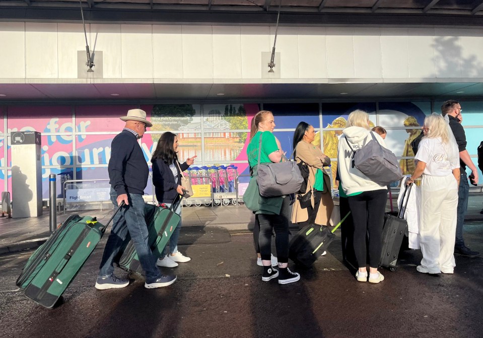 Airline passengers faced huge queues at Birmingham Airport this morning