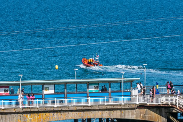 a boat that has the word rescue on it