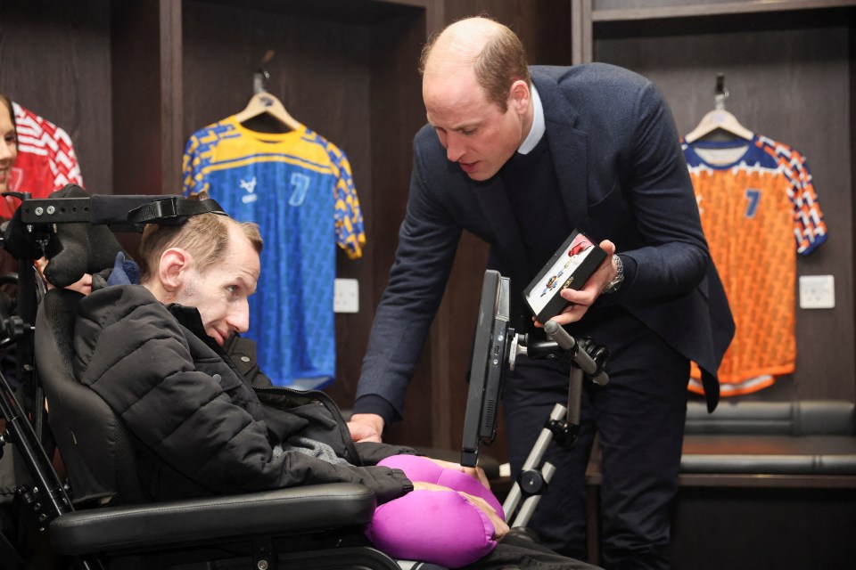 William holding Rob's CBE on January 11