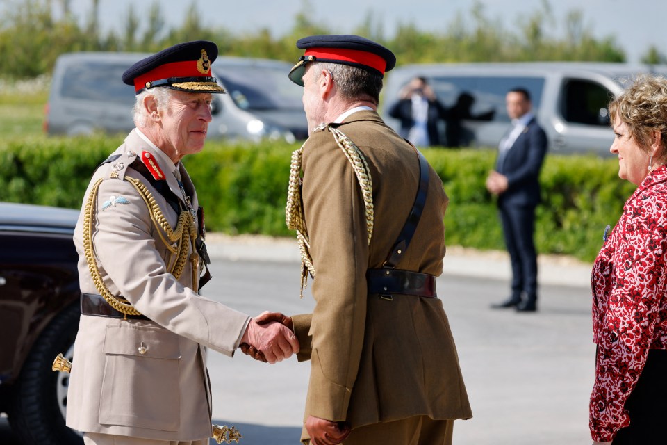 The King was greeted by Lord Peter Ricketts, honorary president of the Normandy Memorial Trust